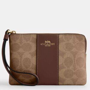 EUC - Coach Corner Zip Wristlet In Signature Canvas With Stripe